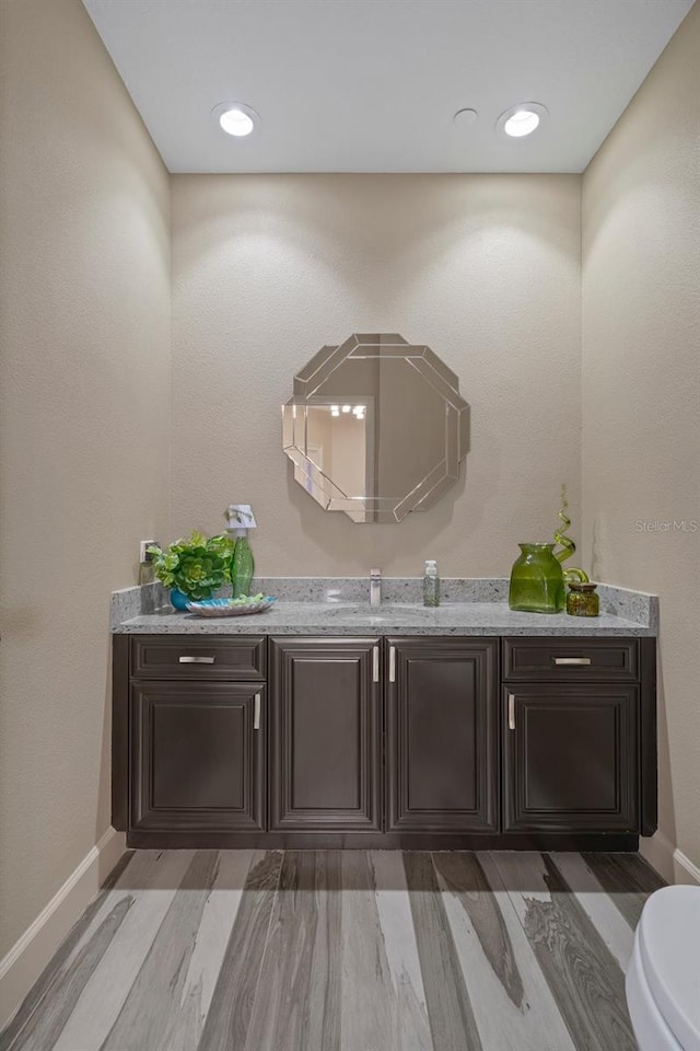 4951 Bacopa Ln S Unit 801, Saint Petersburg, FL 33715 - bathroom with toilet, vanity, and baseboards