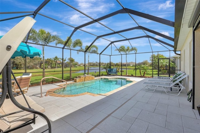 outdoor pool featuring glass enclosure, a lawn, and a patio