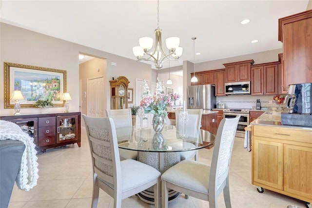 dining space featuring recessed lighting, light tile patterned flooring, and a notable chandelier