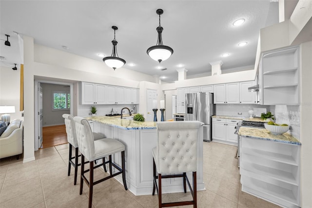 11815 Marblehead Dr, Tampa, FL 33626 - kitchen featuring white cabinets, light tile patterned flooring, appliances with stainless steel finishes, and open shelves
