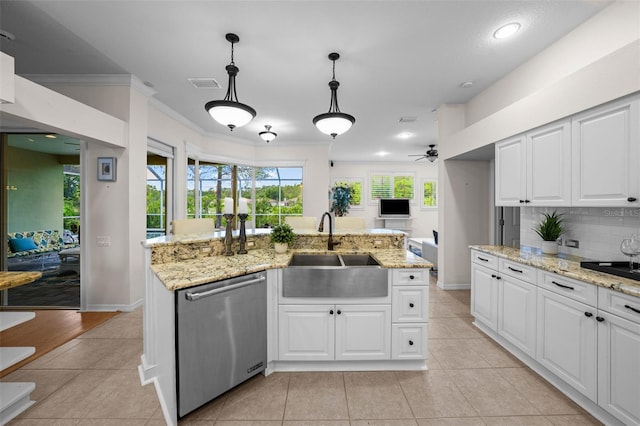 11815 Marblehead Dr, Tampa, FL 33626 - kitchen with light tile patterned floors, stainless steel dishwasher, backsplash, a sink, and a ceiling fan
