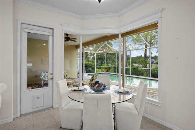 11815 Marblehead Dr, Tampa, FL 33626 - dining room with tile patterned flooring, plenty of natural light, a sunroom, and crown molding