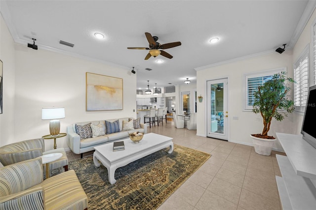 11815 Marblehead Dr, Tampa, FL 33626 - living room featuring baseboards, crown molding, light tile patterned floors, and a ceiling fan