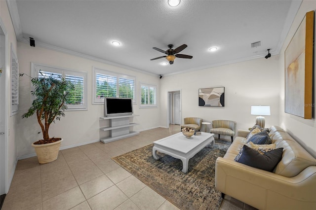 11815 Marblehead Dr, Tampa, FL 33626 - living room with light tile patterned flooring, crown molding, baseboards, visible vents, and ceiling fan