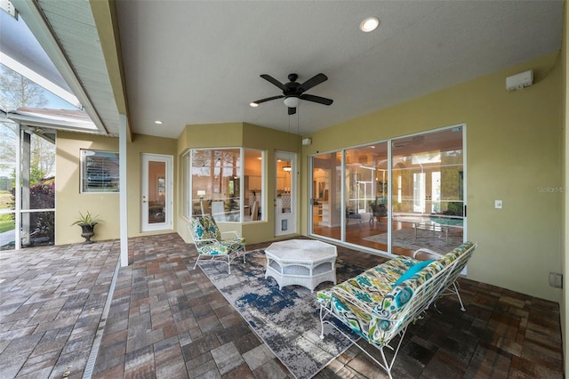 11815 Marblehead Dr, Tampa, FL 33626 - view of patio featuring glass enclosure and a ceiling fan