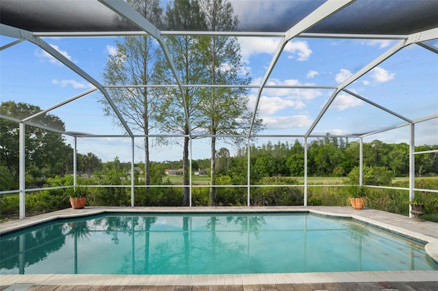 11815 Marblehead Dr, Tampa, FL 33626 - outdoor pool with a lanai and a patio area