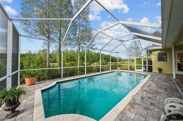 11815 Marblehead Dr, Tampa, FL 33626 - outdoor pool with glass enclosure and a patio area