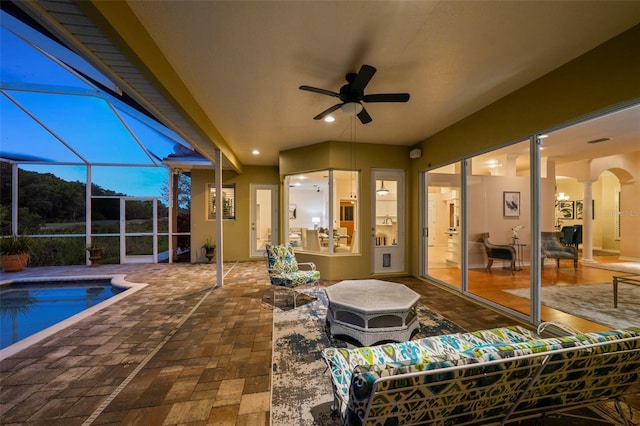 11815 Marblehead Dr, Tampa, FL 33626 - view of patio with glass enclosure, an outdoor pool, and a ceiling fan