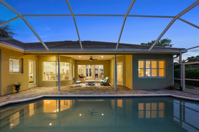 11815 Marblehead Dr, Tampa, FL 33626 - rear view of house with a lanai, stucco siding, and a patio