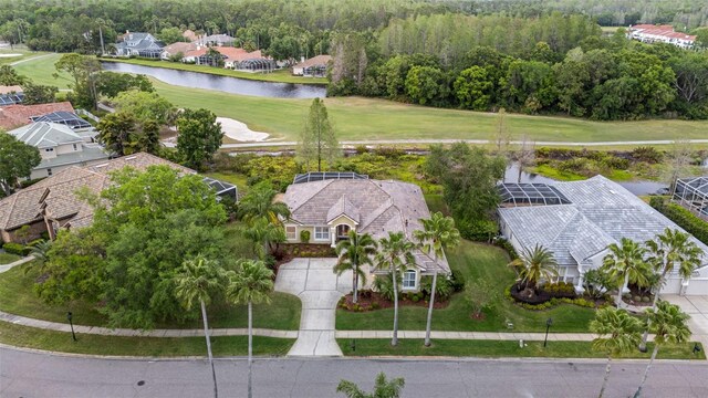 11815 Marblehead Dr, Tampa, FL 33626 - birds eye view of property with a water view, view of golf course, and a residential view