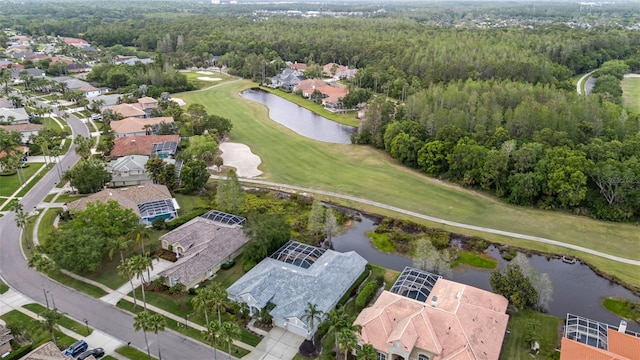 11815 Marblehead Dr, Tampa, FL 33626 - drone / aerial view featuring a water view, view of golf course, and a residential view
