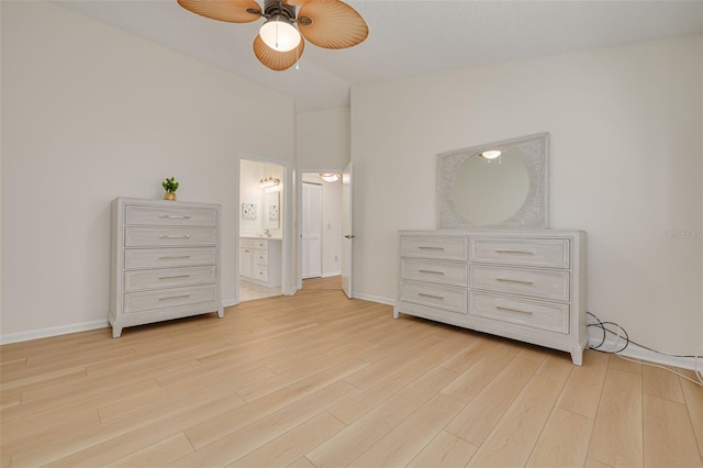 bedroom featuring ceiling fan, light wood finished floors, connected bathroom, and baseboards