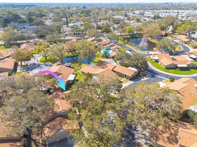 aerial view with a residential view and a water view