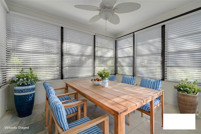 dining area with a ceiling fan