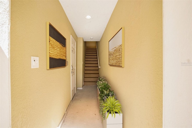 corridor featuring stairway