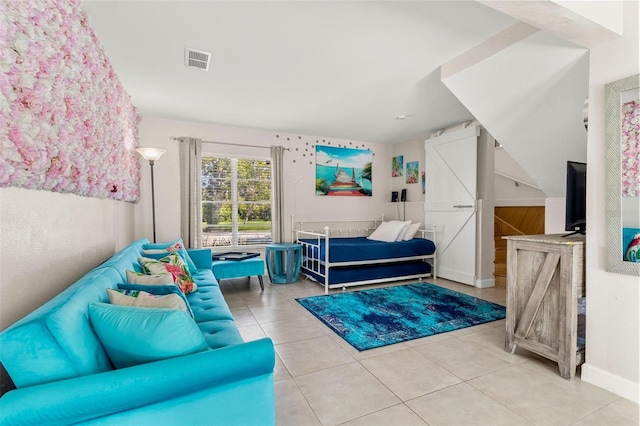 tiled bedroom featuring visible vents