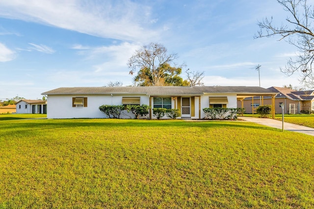 ranch-style home with a front lawn and stucco siding