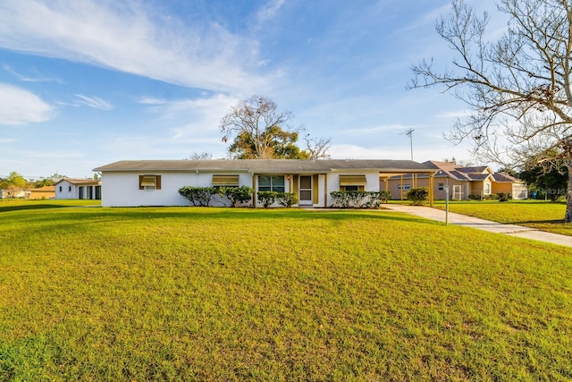 ranch-style home with a front lawn