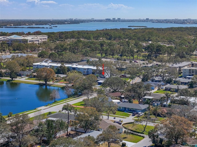 birds eye view of property featuring a water view and a residential view