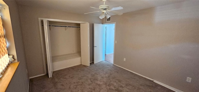 unfurnished bedroom featuring a ceiling fan, visible vents, baseboards, a closet, and carpet