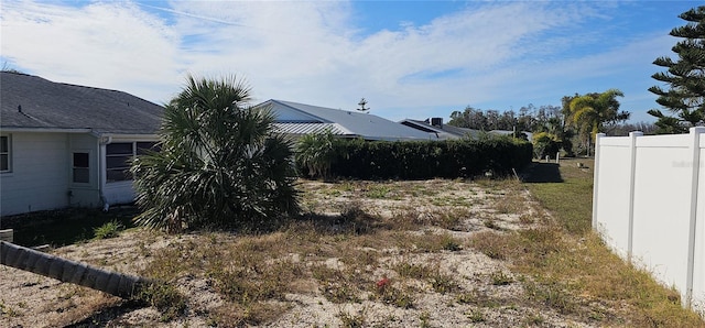 view of yard featuring fence