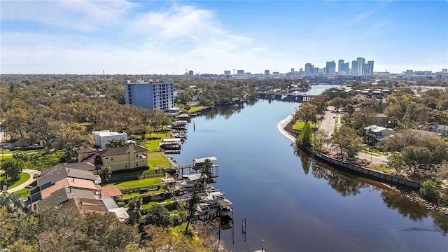 aerial view featuring a city view and a water view