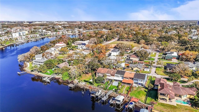 birds eye view of property featuring a residential view and a water view