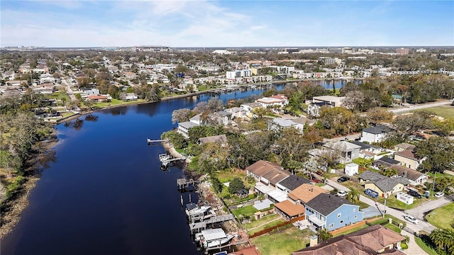 bird's eye view featuring a water view and a residential view