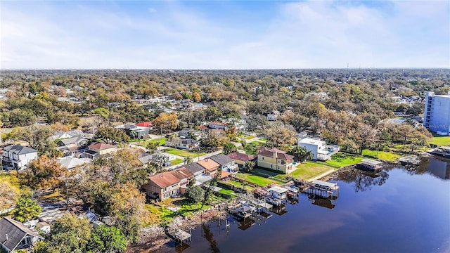 aerial view with a residential view and a water view