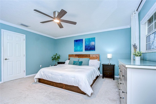 bedroom featuring light carpet, baseboards, visible vents, ceiling fan, and ornamental molding