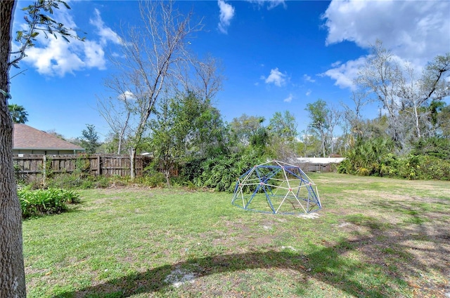 view of yard featuring fence