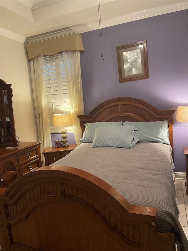 bedroom with ornamental molding