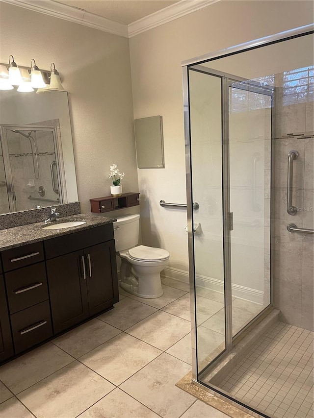 full bathroom with a stall shower, toilet, tile patterned floors, crown molding, and vanity