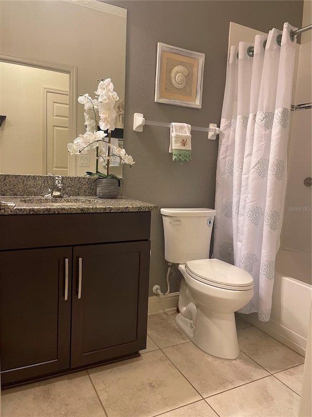 full bath with toilet, tile patterned floors, shower / bathtub combination with curtain, and vanity