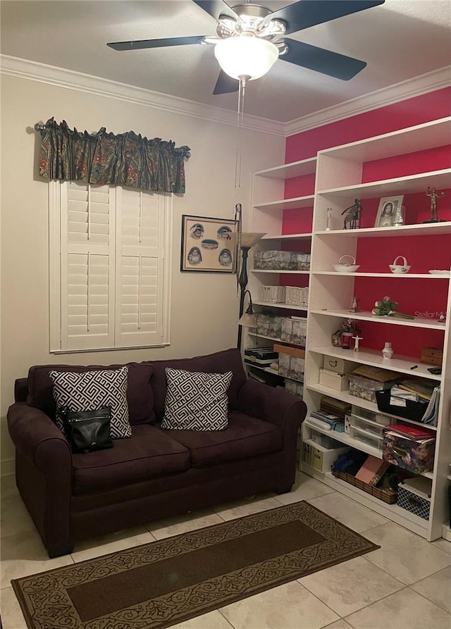 living room featuring ornamental molding, tile patterned flooring, and a ceiling fan