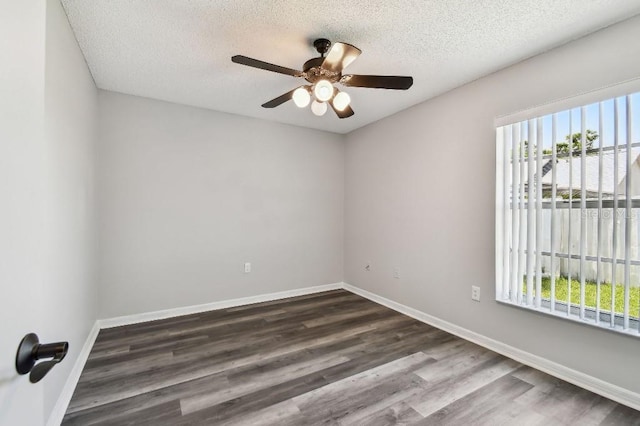 915 Brittany Park Blvd, Tarpon Springs, FL 34689 - empty room featuring wood finished floors, ceiling fan, baseboards, and a textured ceiling