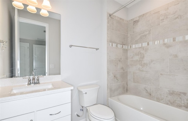 bathroom featuring  shower combination, vanity, and toilet