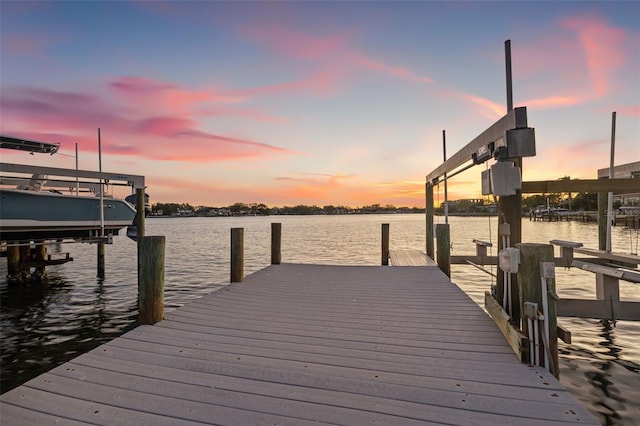 view of dock featuring a water view and boat lift