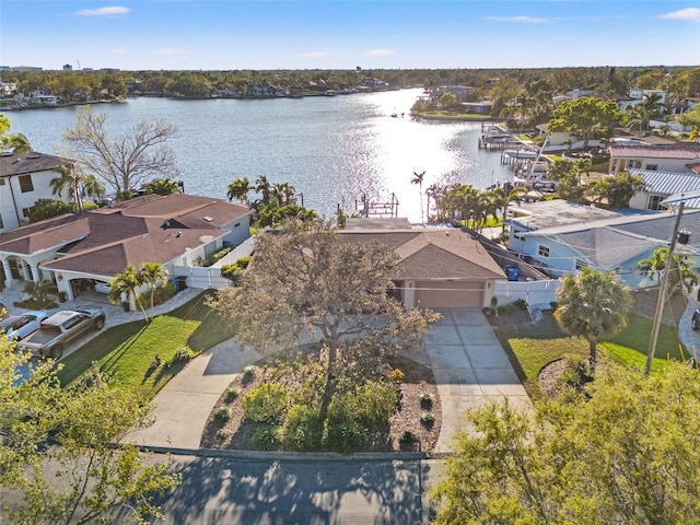 bird's eye view featuring a residential view and a water view