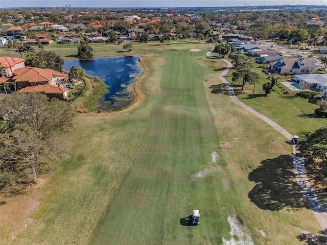 birds eye view of property featuring a residential view, a water view, and golf course view