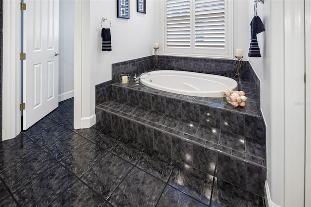 bathroom with a garden tub