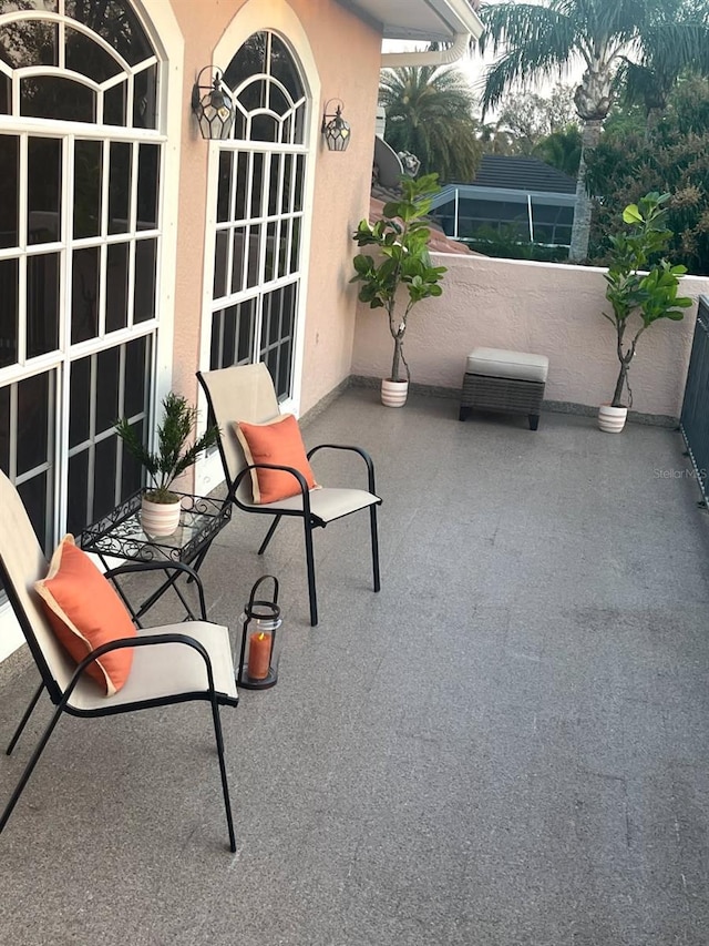 view of patio with a balcony