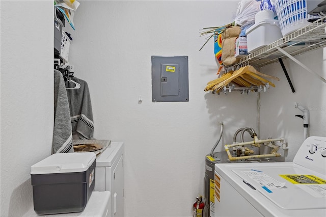 washroom with laundry area, electric panel, and independent washer and dryer