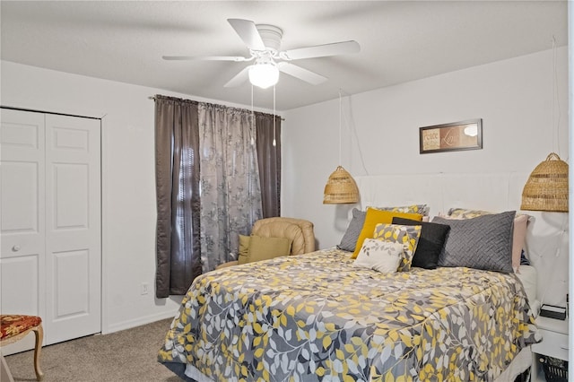 carpeted bedroom with a ceiling fan