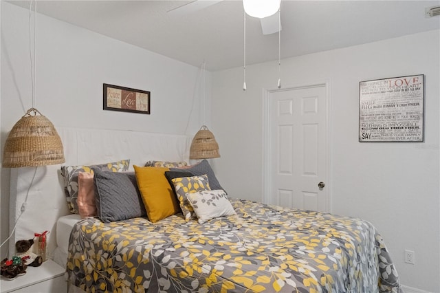 bedroom featuring ceiling fan and visible vents