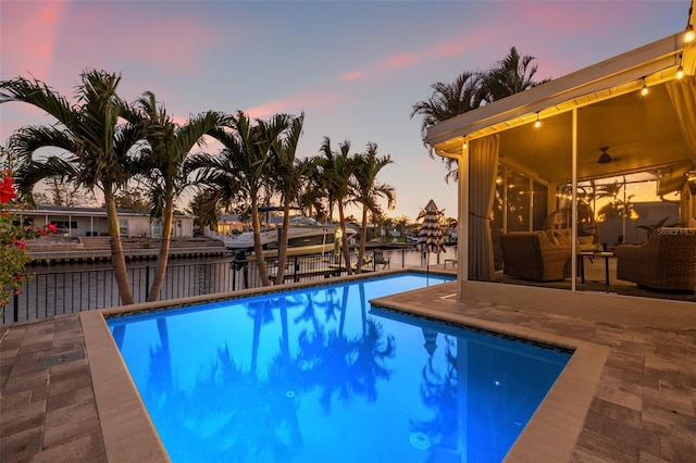 pool with a patio area