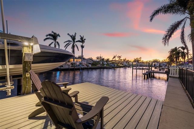 view of dock featuring a water view and boat lift