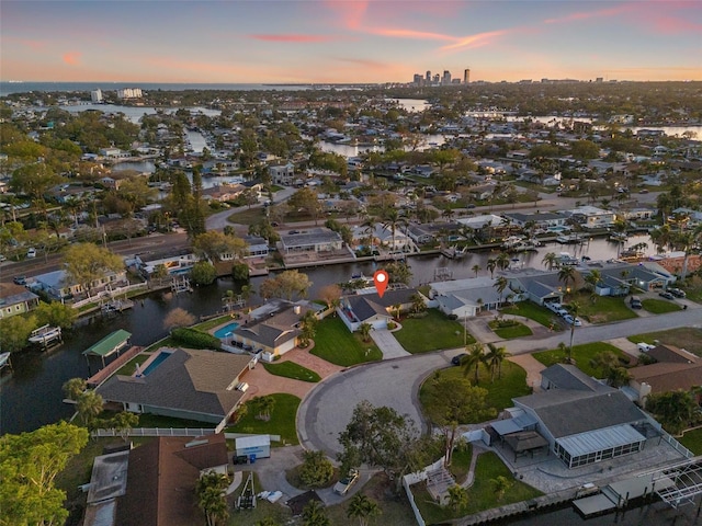 aerial view with a residential view and a water view