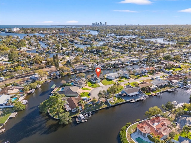 bird's eye view featuring a residential view and a water view