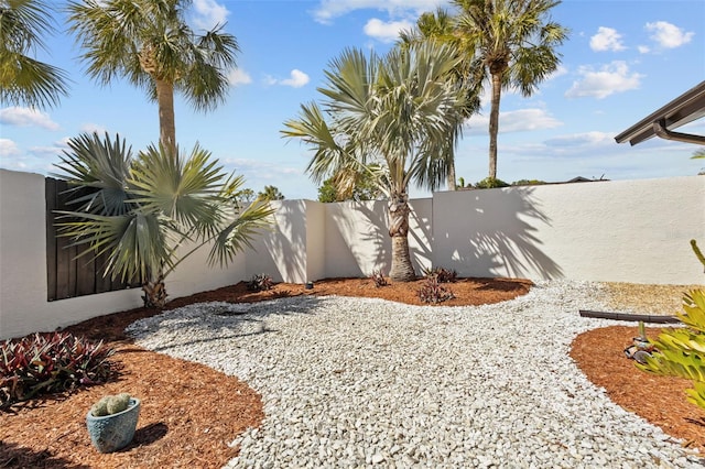 view of yard featuring a fenced backyard